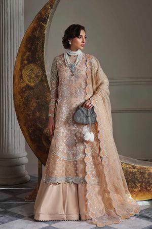 Woman in a beige embroidered traditional outfit standing in an elegant interior setting.
Aabroza BY RUUPOSH COLLECTION -01