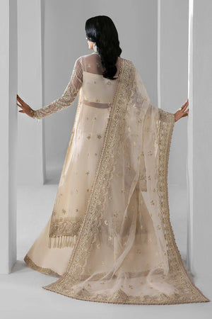 Woman wearing a beige traditional outfit with a matching dupatta against a white background.
Eclipse_By_Ruuposh_Collection_3