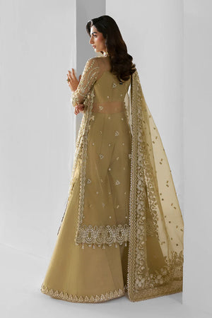 Woman wearing a beige embroidered traditional outfit with a white background.
Elixir_By_Ruuposh_Collection_2