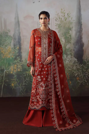 Woman wearing a red embroidered traditional outfit with a scenic background