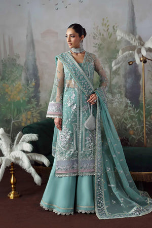 Woman in a traditional light blue embroidered outfit with a floral background. shahnam