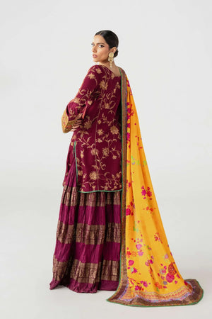 Woman wearing a maroon traditional outfit with a yellow floral dupatta on a white background.
tojis By Ruuposh Collection 06